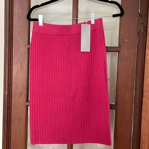 Never worn with tags. Carlisle pink fitted skirt. Size small.